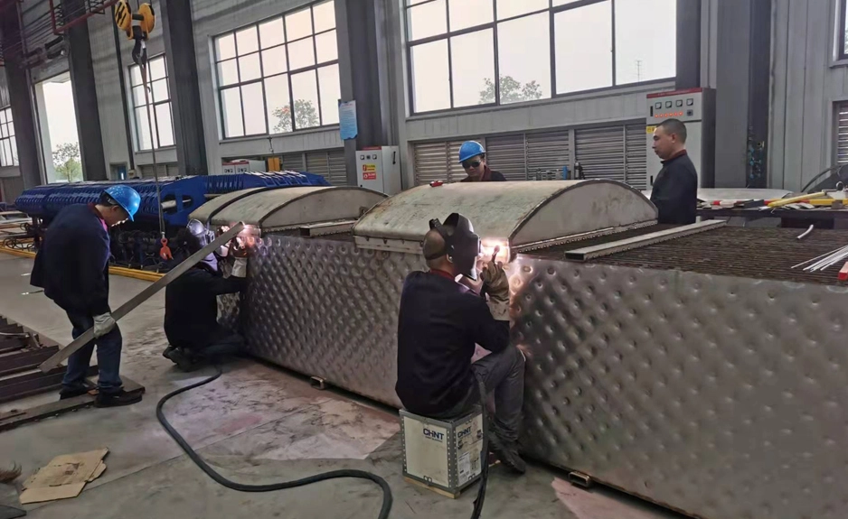 Sistema de evaporación por película descendente de placas